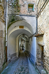 Fototapeta na wymiar A narrow street in Castelcivita, a small village of the province of Salerno, Italy. 