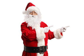 Santa Claus pointing with both hands