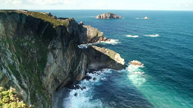 Seascape of Atlantic ocean and Asturias rocky coast at Cape Penas. Sea shore with high cliffs in north Spain.