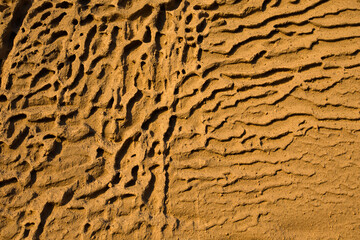 Closeup of Vlychada beach volcanic ash sand rock formation on Santorini island in Greece