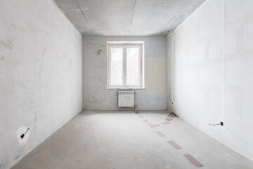 interior of the apartment without decoration in gray colors