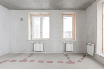 interior of the apartment without decoration in gray colors