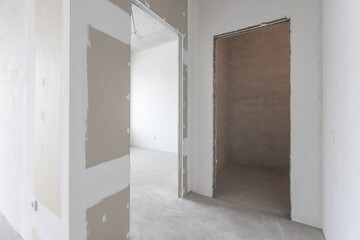 interior of the apartment without decoration in gray colors