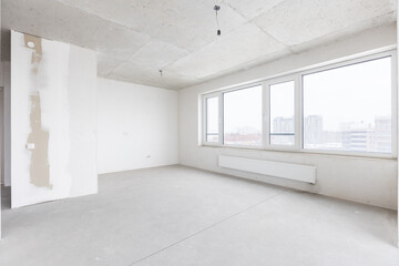 interior of the apartment without decoration in gray colors