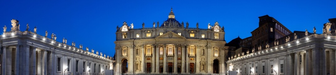 Fototapeta na wymiar Panorama in Piazza San Pietro, or Saint Peters Square, during the blue hour with a view of the basilica in Vatican City.