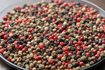 Pile of pepper seeds as background. Perspective view