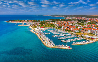 Zadar, Croatia - Aerial view of Zadar yacht marina with sailboats, yachts, blue sky and turquoise...