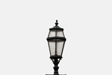 Fototapeta na wymiar Top part of an old street lamp