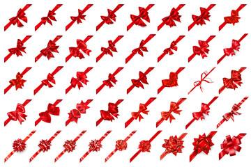 Set of 41 beautiful realistic big red bows of various shapes with ribbons arranged diagonally. With shadows, on white background. Vector illustration