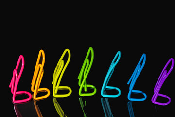 Colored paper clips one after the other