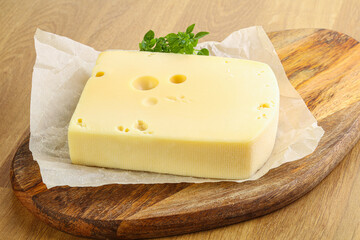 Maasdam cheese over the board