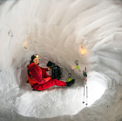 Climber in a snow cave.