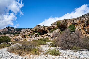 A valley and rocky peaks in the Lefka Ori mountains on the island of Crete