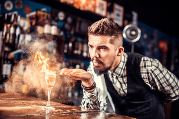 Barman concocts a cocktail on the beerhouse