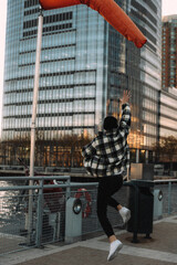 Jumping man on the waterfront