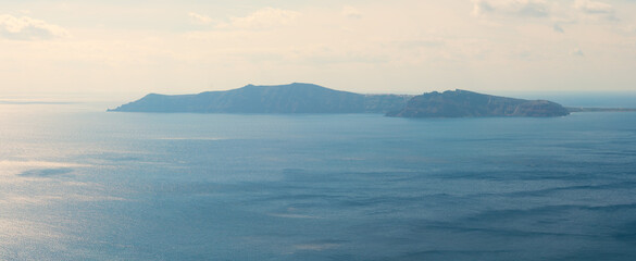 ocean and island in fog