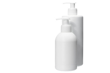 two several size matte opaque white plastic bottle with dispenser for portion use of liquid soap for hygiene and skin care, isolated object on white background with copy space, nobody. - obrazy, fototapety, plakaty