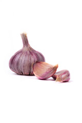 natural seasoning for the dish. garlic head and clove. on a white background. close-up