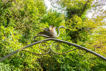 Background with swan and iron arch