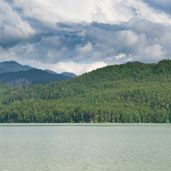 Forggensee Mountain Lake in the south of Bavaria, Germany and the mountains on horizon
