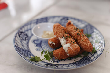 Breaded cutlets with sauce