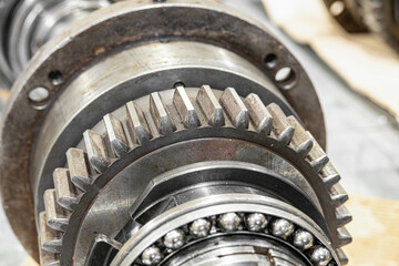 Disassembled spindles of cnc machines for repair in a metalworking equipment repair workshop.
