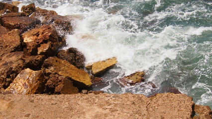 Scenic colorful  sea coast. Good for wallpaper or background image Radiant sea beach Panoramic photo . Sea rocks beach. Wave