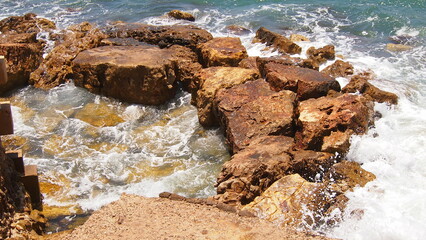 Scenic colorful  sea coast. Good for wallpaper or background image Radiant sea beach Panoramic photo . Sea rocks beach. Wave