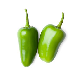 Ripe jalapeno or pepperoni isolated on white background. Closeup view of green chili pepper. Hot spice