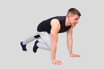 Sport man Standing in Plank Doing ABS Exersice. Sportsman Plank Exercise