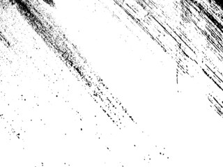Grunge is black and white. Texture of black strokes on a white background. Abstract chaotic movements with a dry brush. Monochrome pattern of worn surface