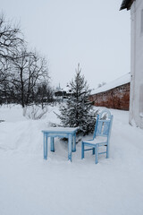 Chair and table in the snow. Rostov