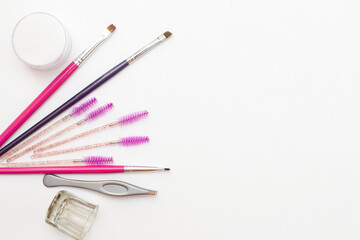 flatley. Eyebrow design. Painting with henna, paint. Eyebrow materials on a white background.