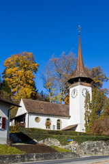 Fototapeta na wymiar the Reformed village church (built in 12th century) of Gerzensee in the canton of Bern, Switzerland