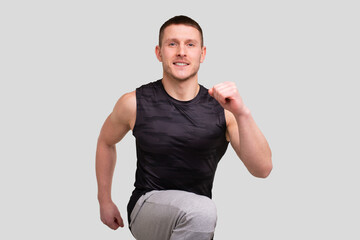 Sport man Warming Up. Pre workout Warm up Close Up. Man Doing Excersises Isolated. Runner Warming Up