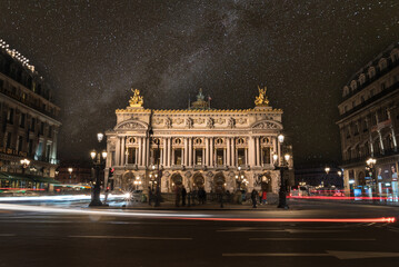 Famous Paris Opera at Night, lights of the traffic leading around