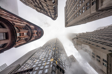 Skyscraper buildings in Manhattan on a foggy winter day, New York City, USA