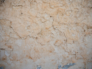 textura pared pintada con desconchones y mal estado por el tiempo