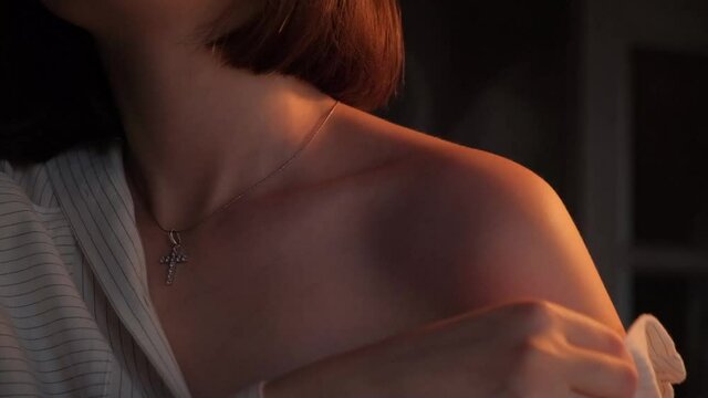 A woman's shoulder with shirt