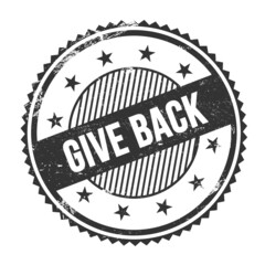 GIVE BACK text written on black grungy round stamp.