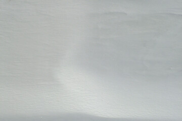 Obraz premium Shadows and patterns on the surface of snow