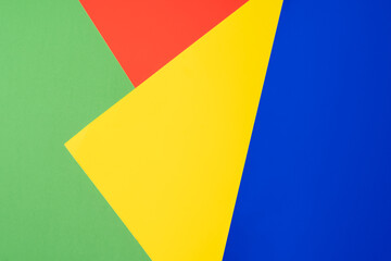 Abstract background with colored paper texture. Minimal composition on paper in red ,yellow,green colors.
