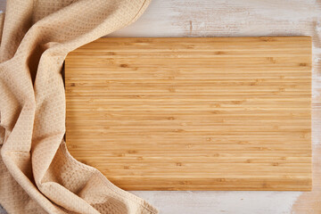 Empty bamboo chopping board with copyspace