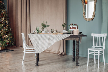 White modern kitchen decorated for Christmas and New Year.