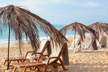 Thailand, Ko Samui. Lounge chairs on a beach. - obrazy, fototapety, plakaty