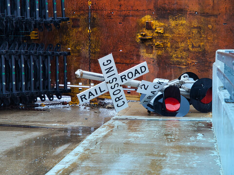 Railroad crossing sign after a train derailment 
