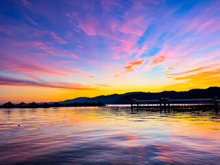 Obraz premium sunset over the river