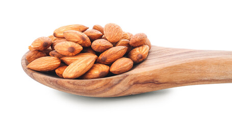 Spoon with almond nuts on white background