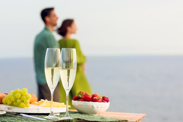 Table set for romantic picnic outdoors