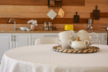 Fototapeta na wymiar Tea set on dining table in kitchen